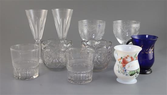 A set of eight Waterford cut glass wines, four Regency rummers and a group of tumblers